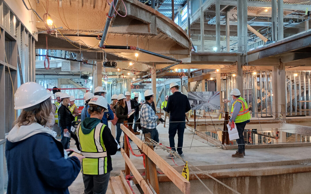 Watertown city and school officials tour the construction site of their new Watertown High School